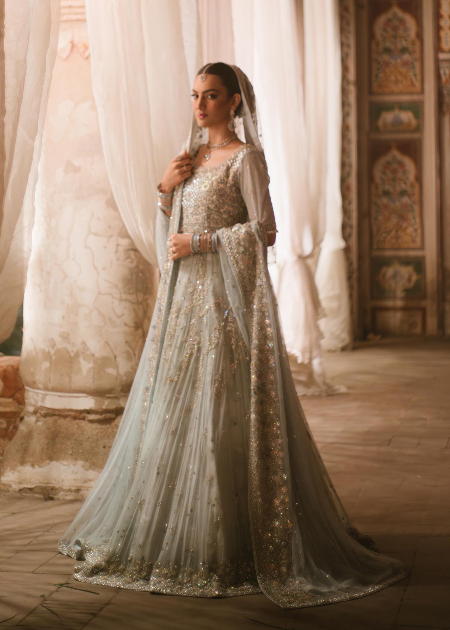 Pakistani Ice Blue Embellished Net Bridal Lehenga (3-Piece) - Image 1