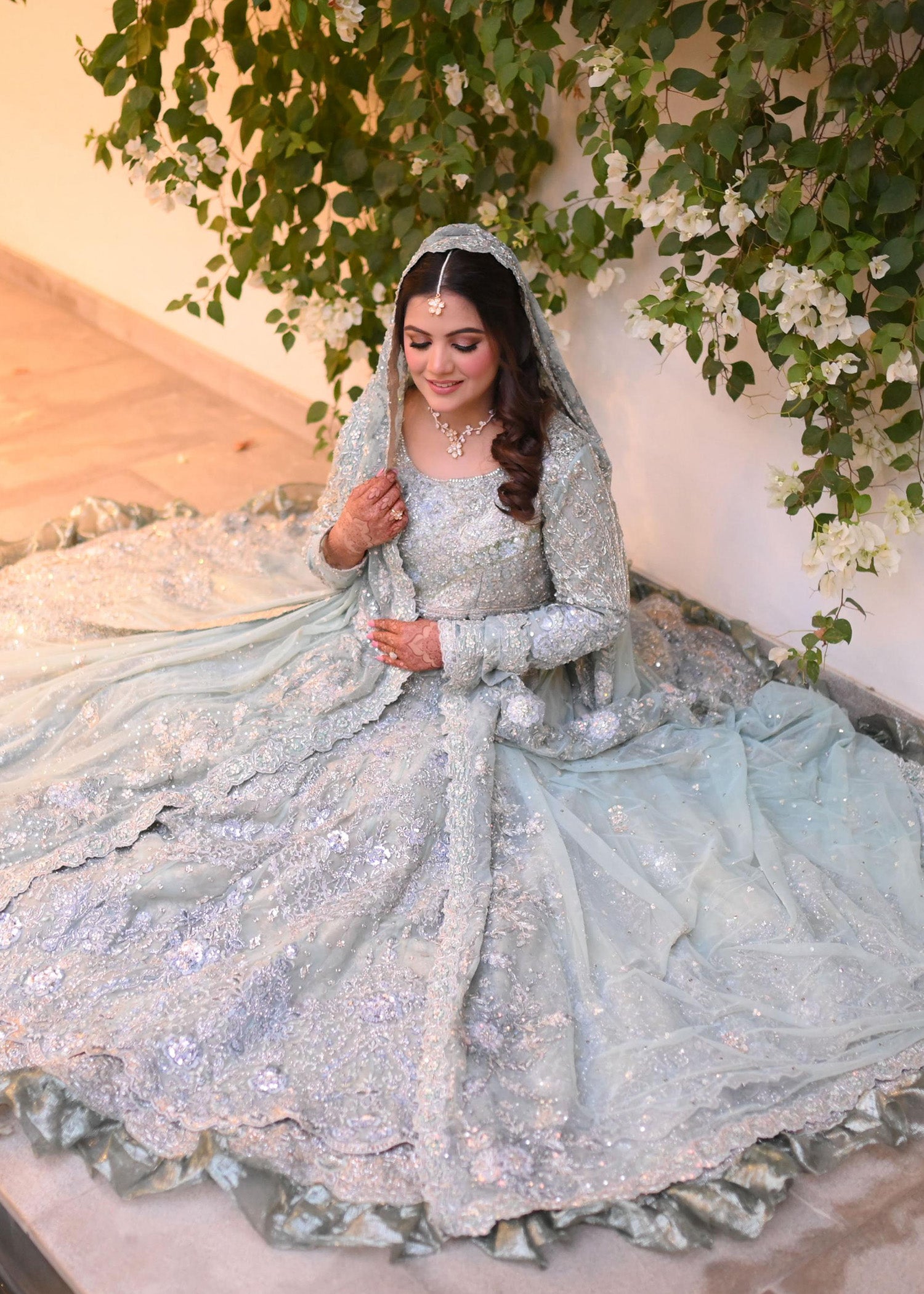 Pakistani Ice Blue Embellished Net Silk Bridal Lehenga (3-Piece) - Image 2