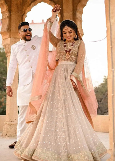 Champagne Peach Embellished Net Bridal Lehenga (3-Piece) - Image 1