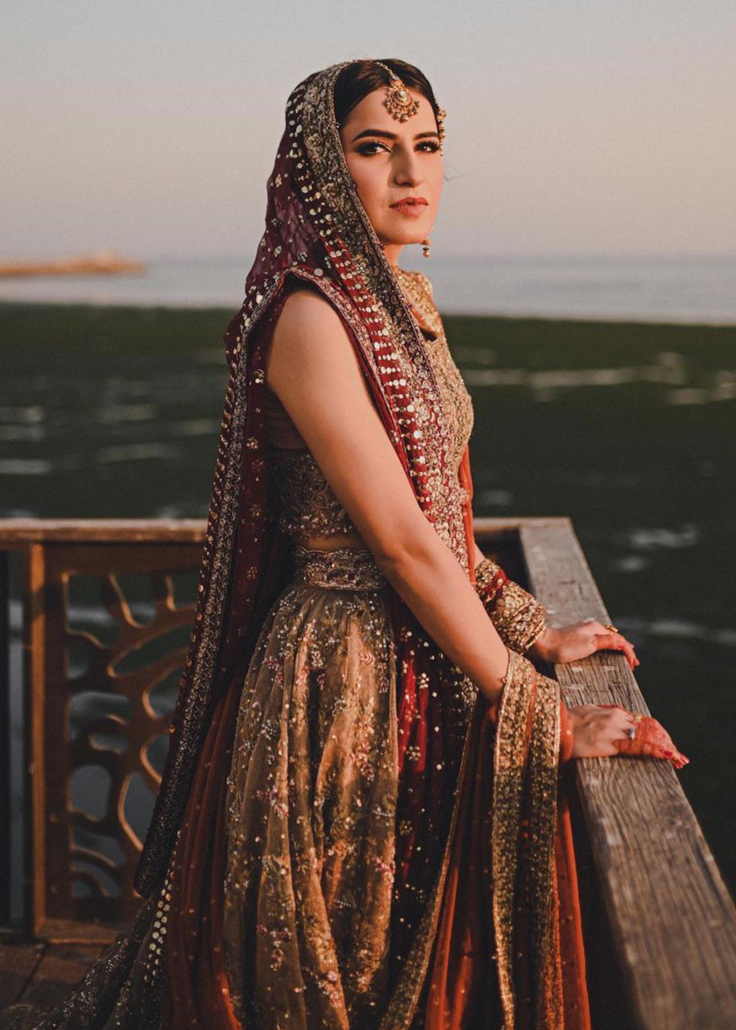 Deep Maroon Gold Embellished Net Silk Bridal Lehenga (3-Piece) - Image 6