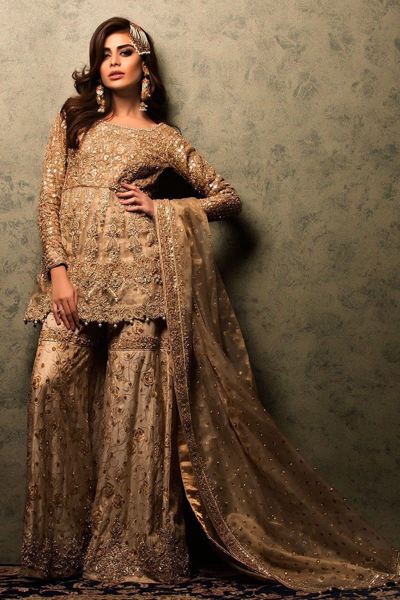 Pakistani Nude Gold Embellished Net Peplum Sharara (3-Piece) - Image 1