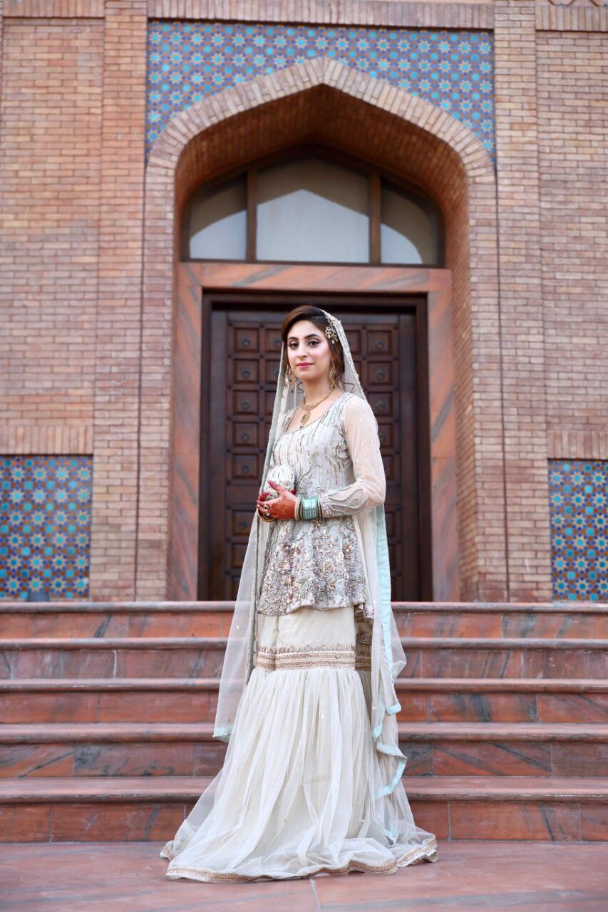 Pakistani Ivory Embellished Chiffon Peplum with Net Gharara (3-Piece) - Image 1