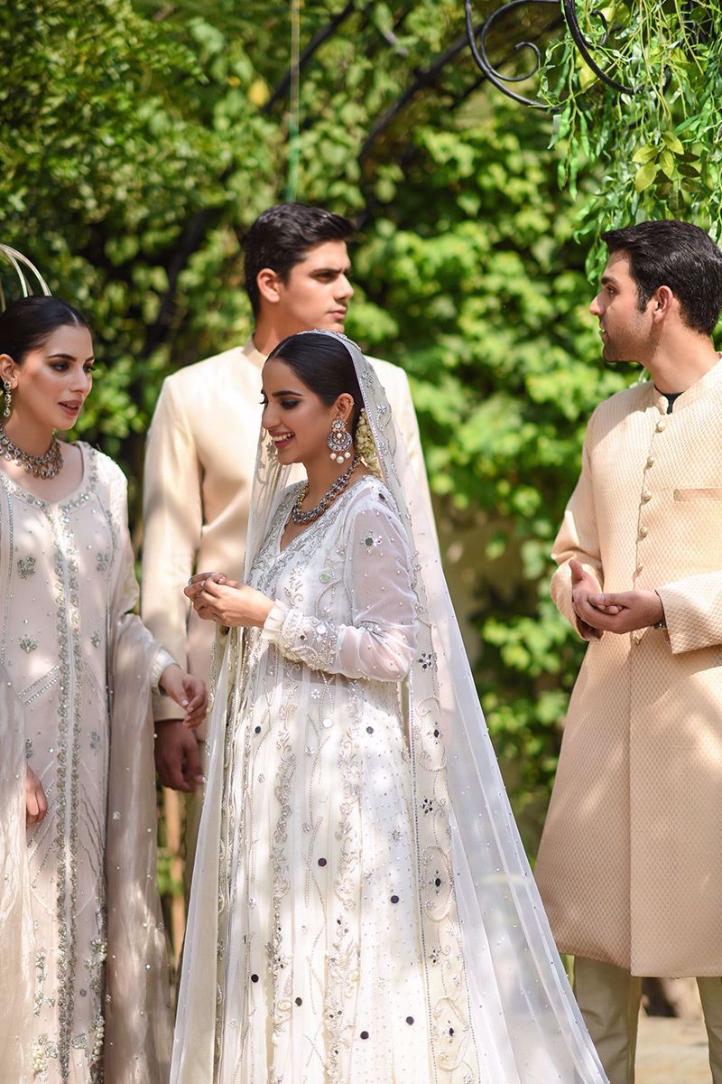 Ivory Embellished Net Bridal Lehenga Set (3-Piece) - Image 9