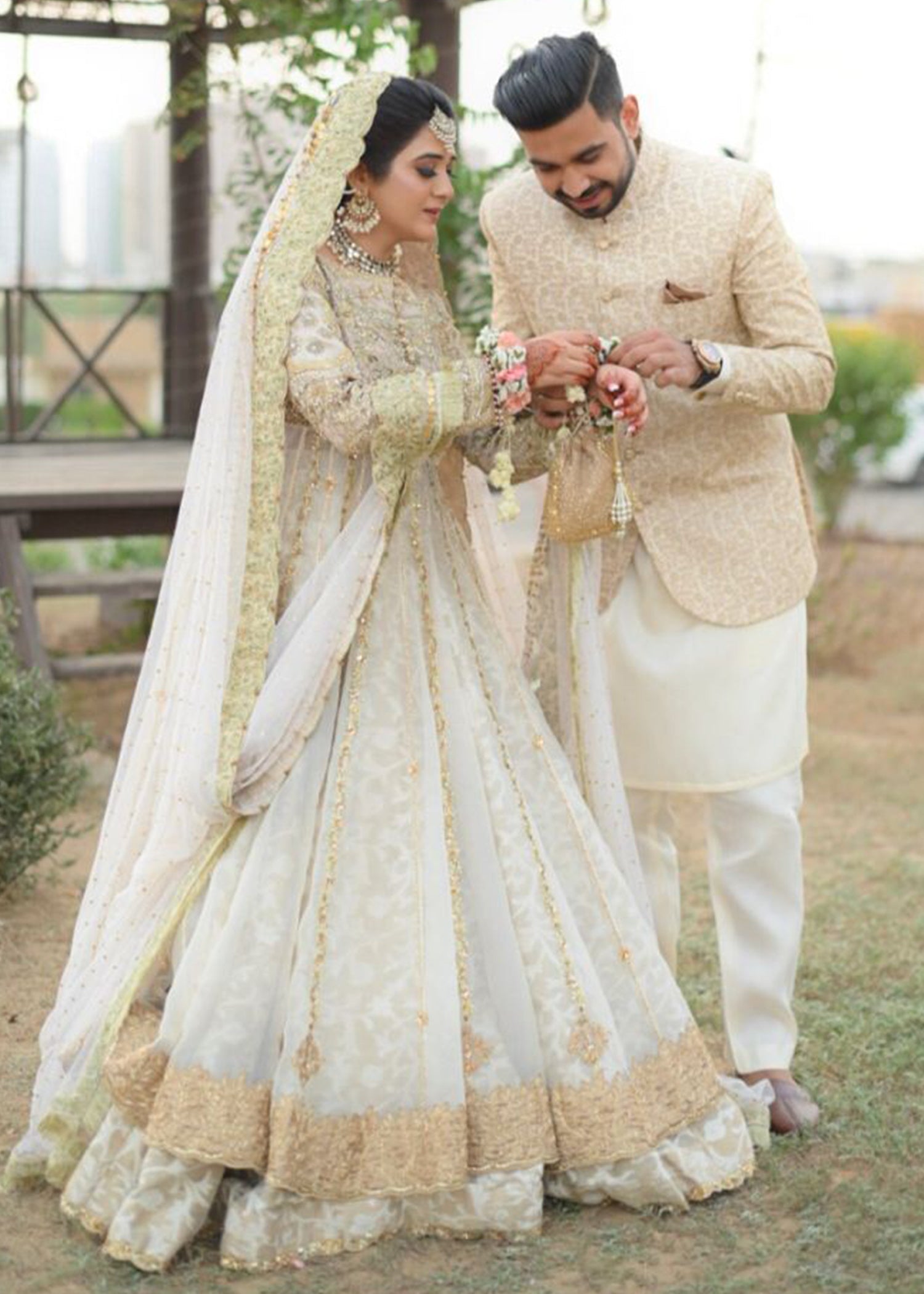 Pakistani Ivory Gold Embellished Net Silk Bridal Lehenga (3-Piece) - Image 4