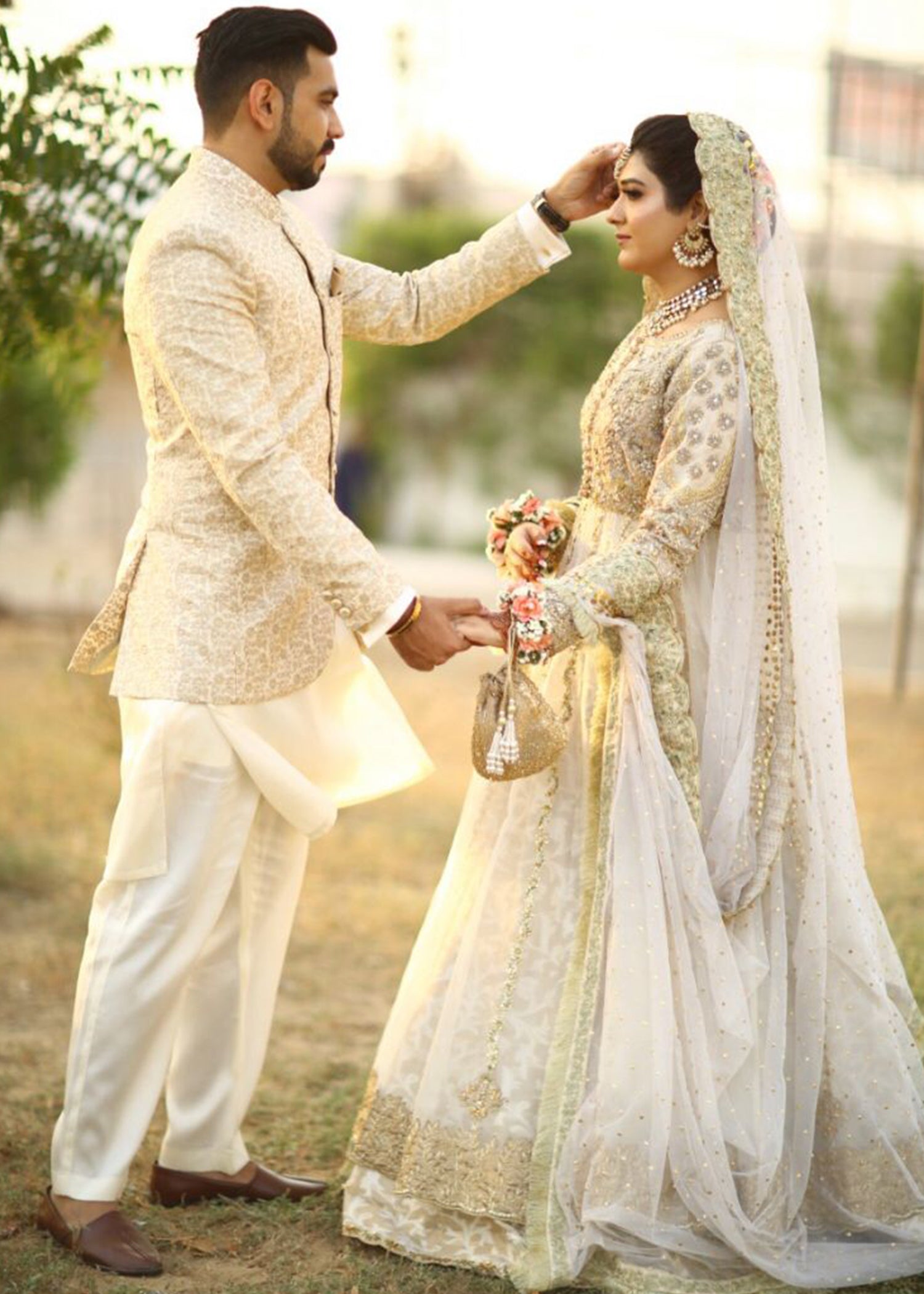 Pakistani Ivory Gold Embellished Net Silk Bridal Lehenga (3-Piece) - Image 8