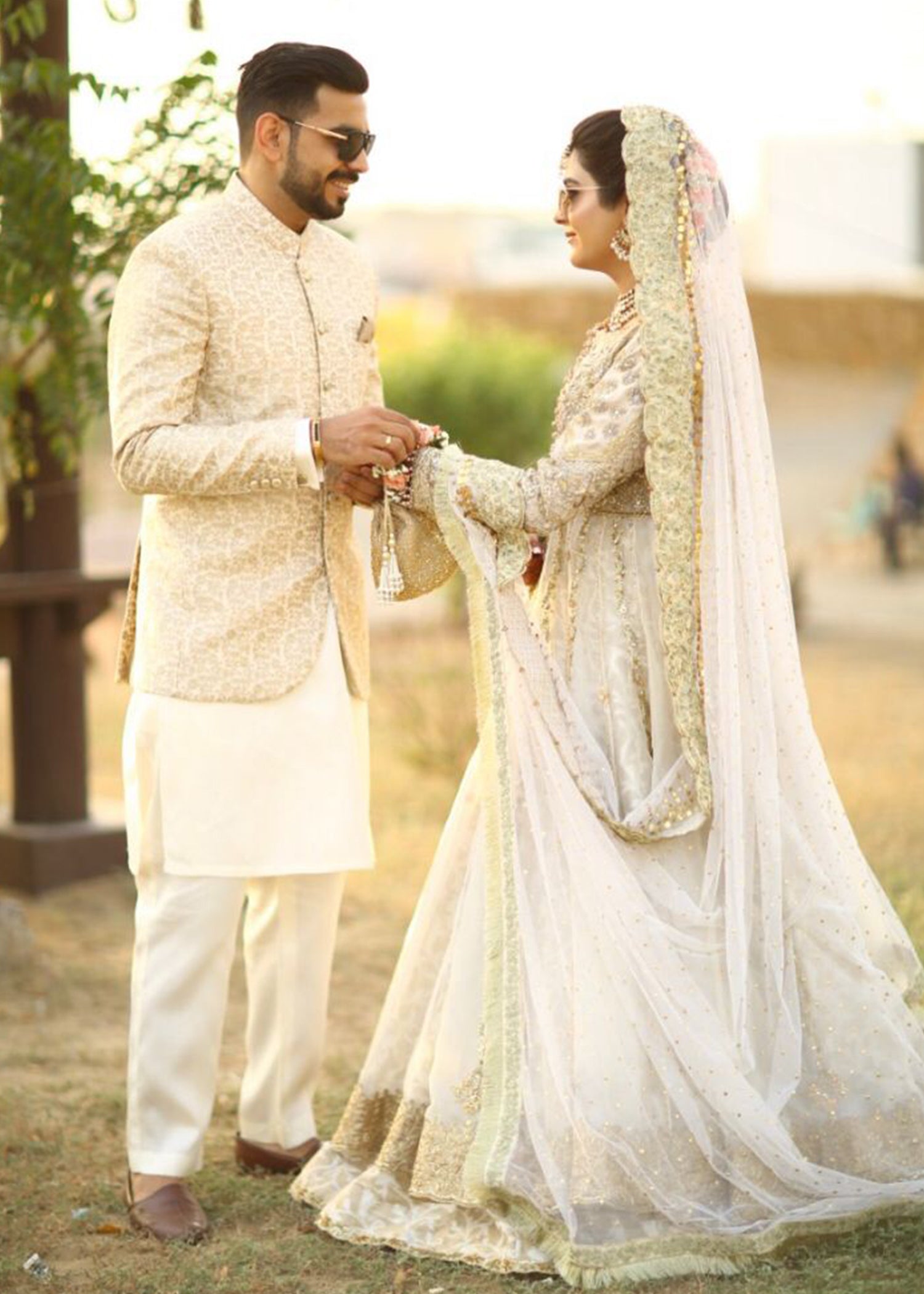 Pakistani Ivory Gold Embellished Net Silk Bridal Lehenga (3-Piece) - Image 9