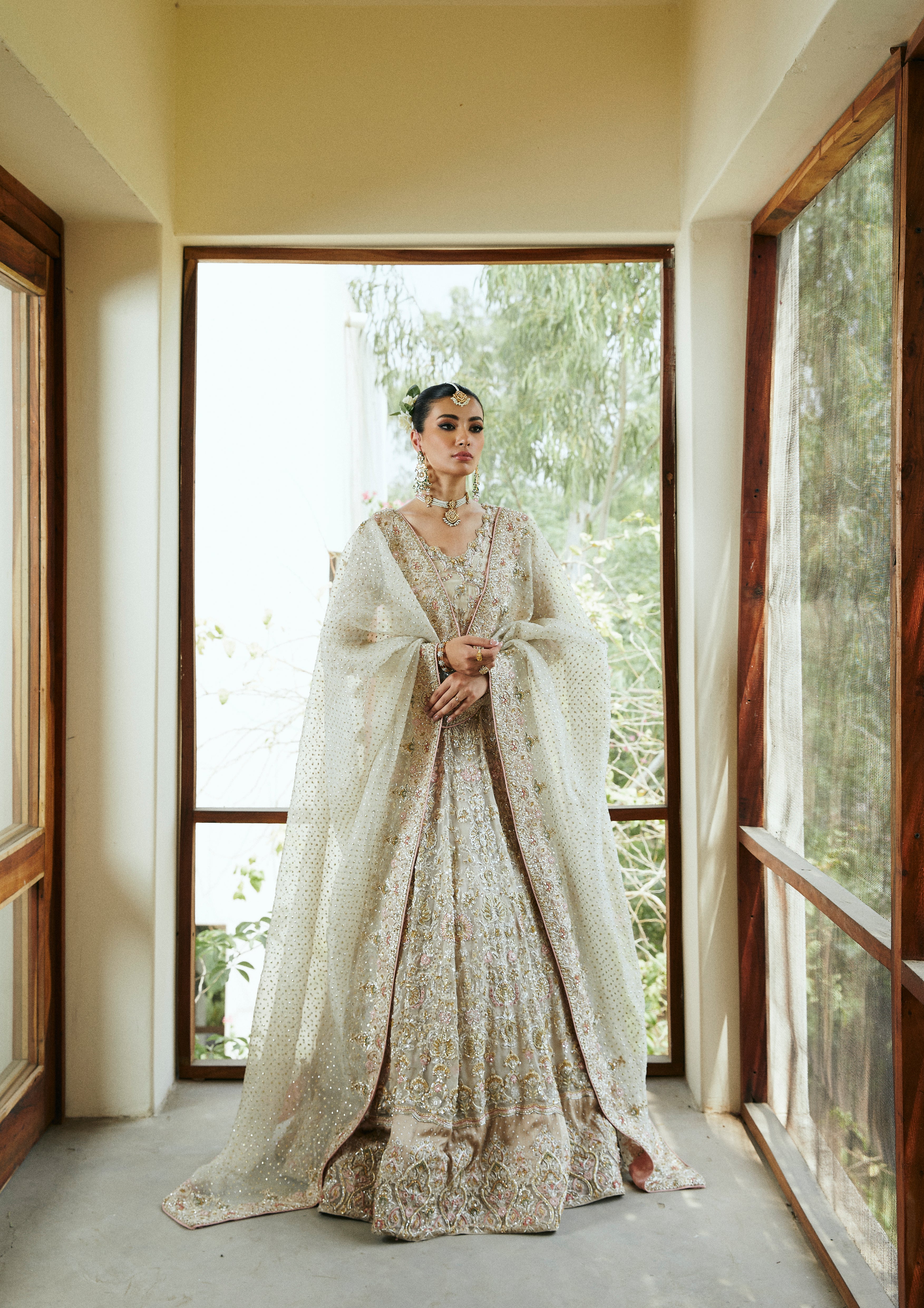 Pakistani Ivory Hand-Embellished Raw Silk Lehenga Choli (3-Piece) - Image 1