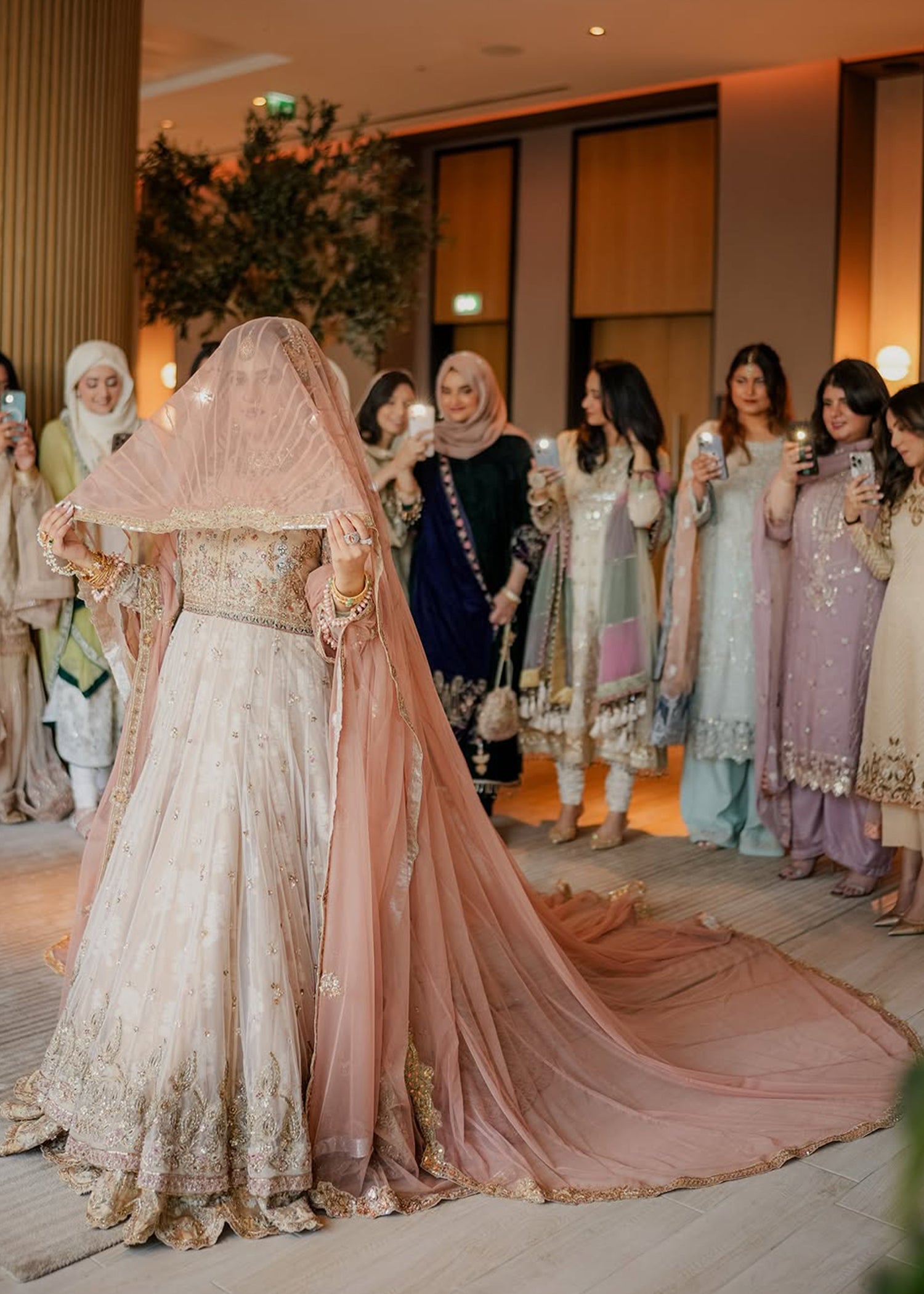 Blush Pink Ivory Embellished Silk Net Bridal Lehenga (3-Piece) - Image 1