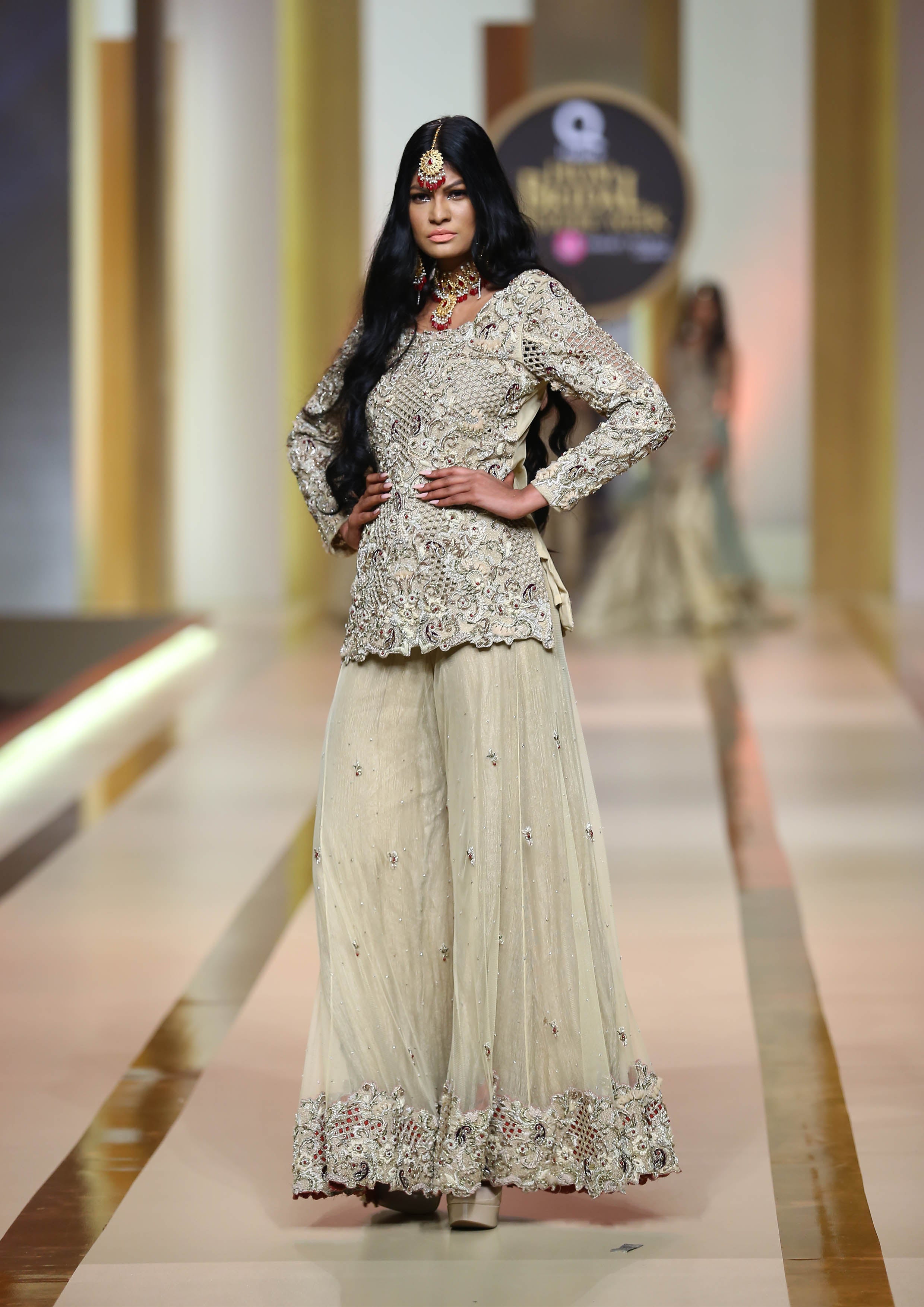 Pakistani Ivory Meshwork Embroidered Net Peplum with Wide-Leg Trousers (2-Piece) - Image 1