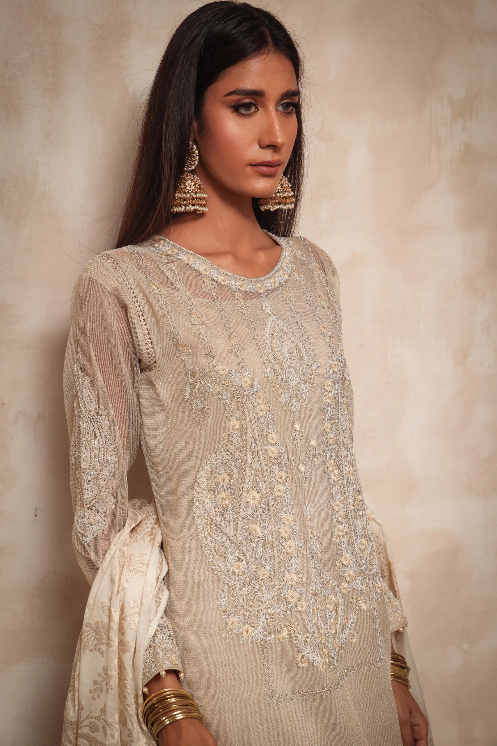 Creme White Embroidered Karandi Khaddi Net Salwar Kameez (3-Piece) - Image 1