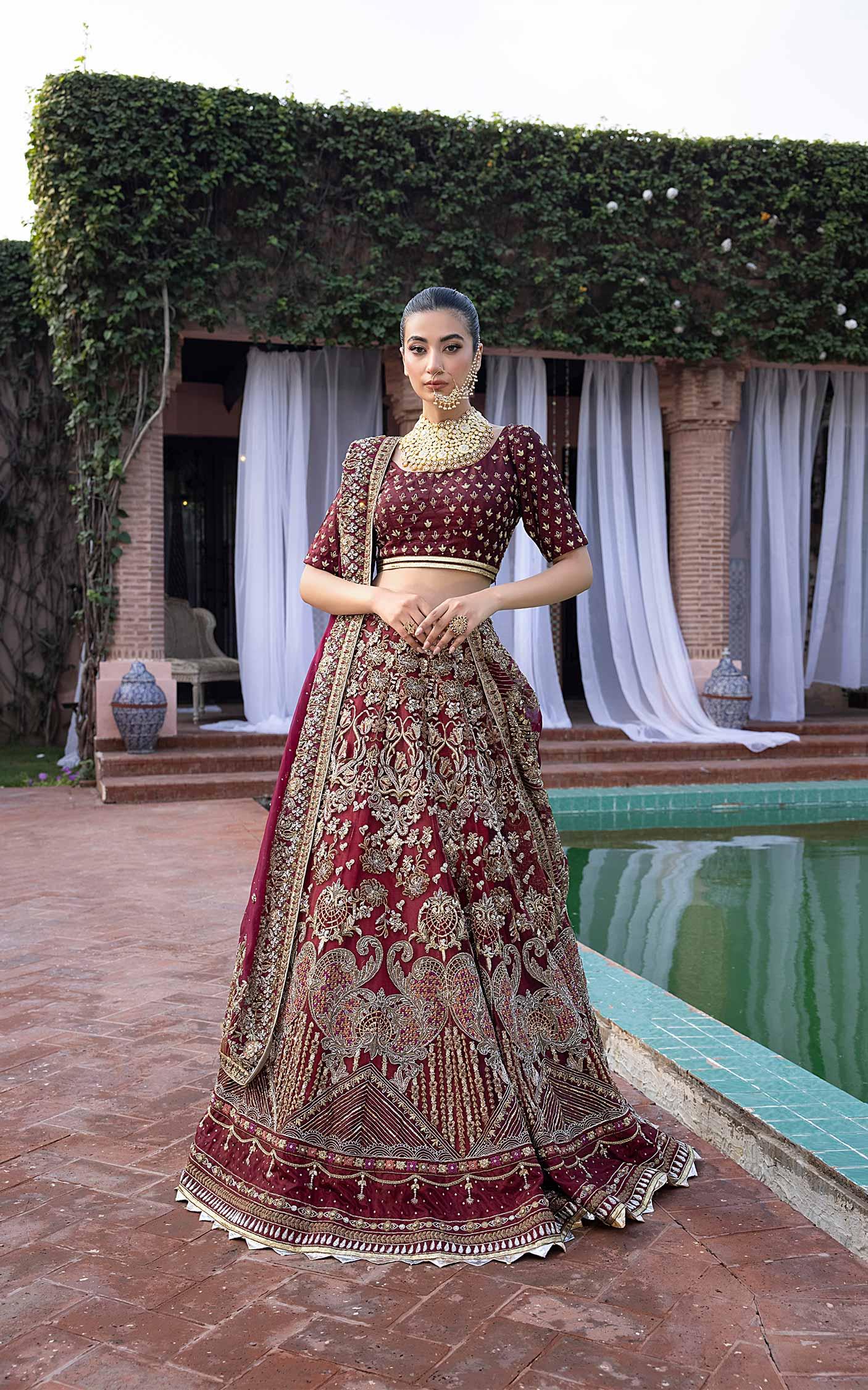 Pakistani Deep Maroon Embroidered Net Bridal Lehenga (3-Piece) - Image 1