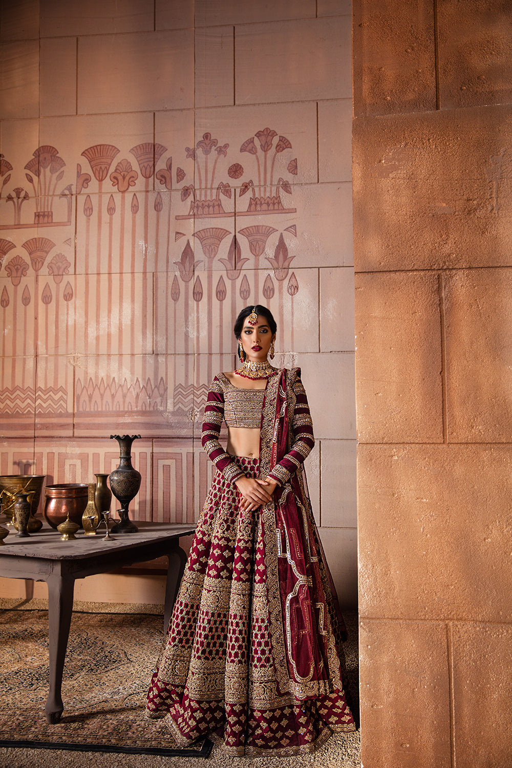 Pakistani Maroon Embellished Raw Silk Bridal Lehenga Choli (3-Piece) - Image 1