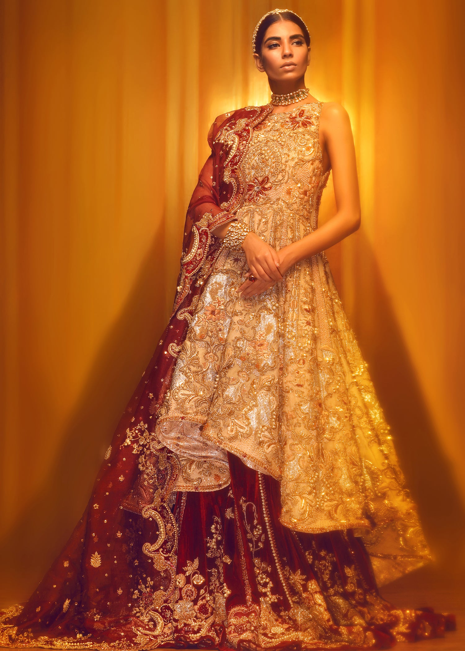 Pakistani Deep Maroon Gold Embellished Velvet Bridal Lehenga (3-Piece) - Image 1