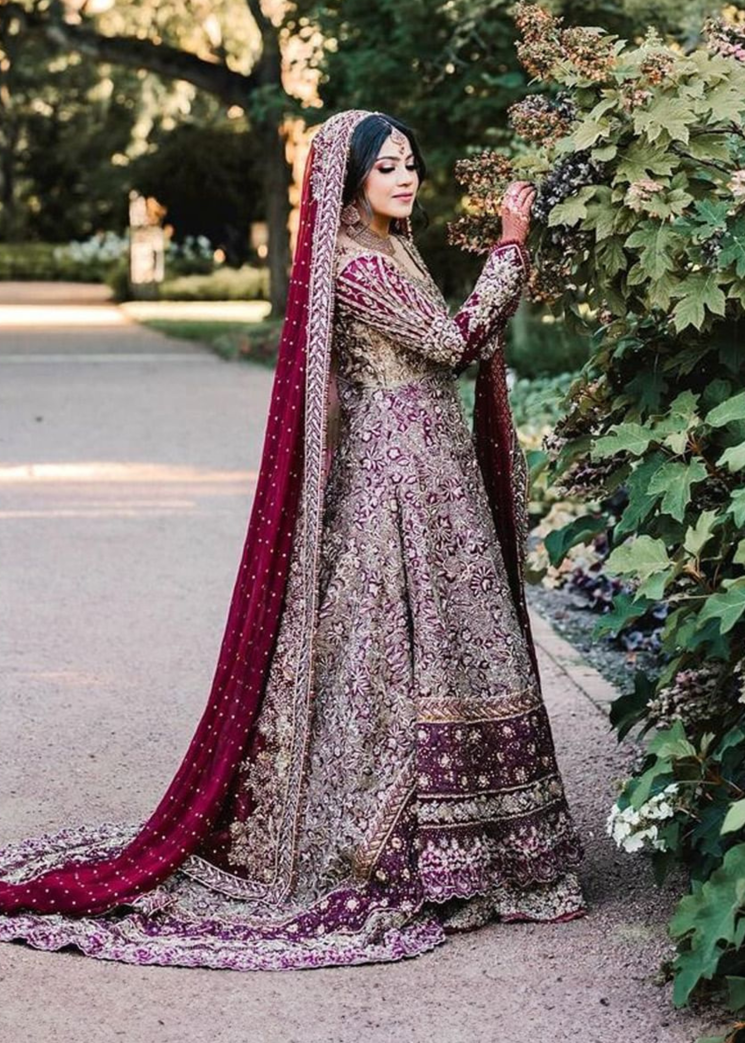 Pakistani Deep Maroon Gold Embroidered Velvet Silk Bridal Lehenga (3-Piece) - Image 1