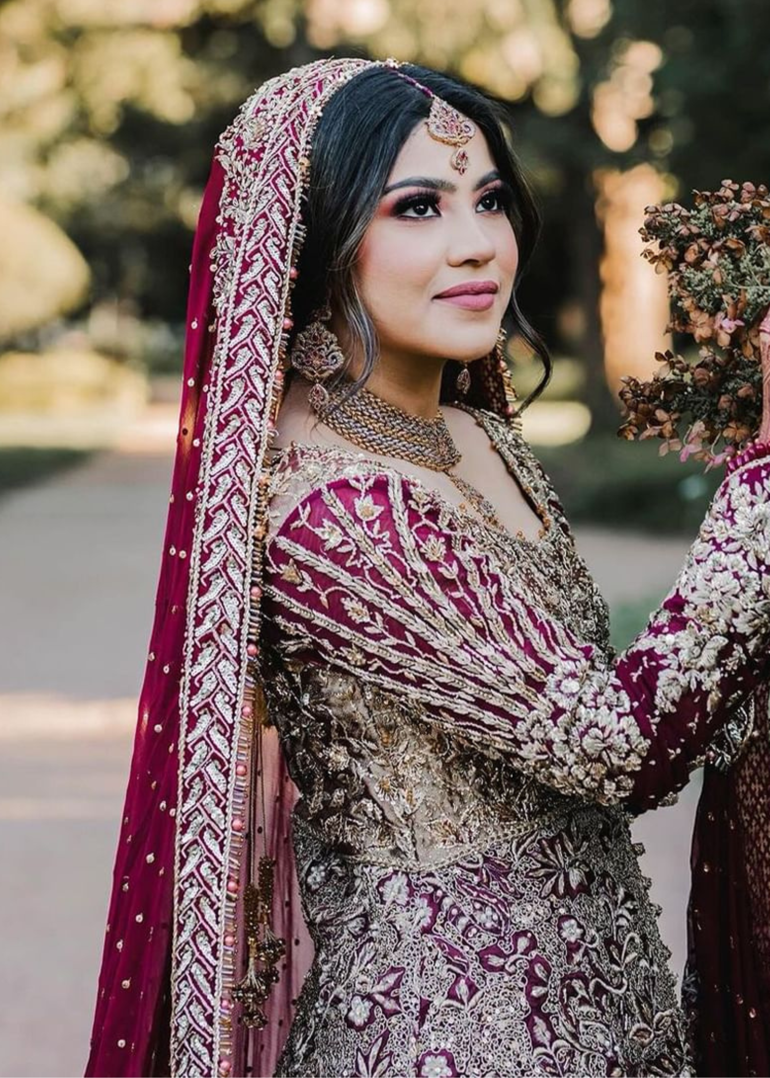 Pakistani Deep Maroon Gold Embroidered Velvet Silk Bridal Lehenga (3-Piece) - Image 2