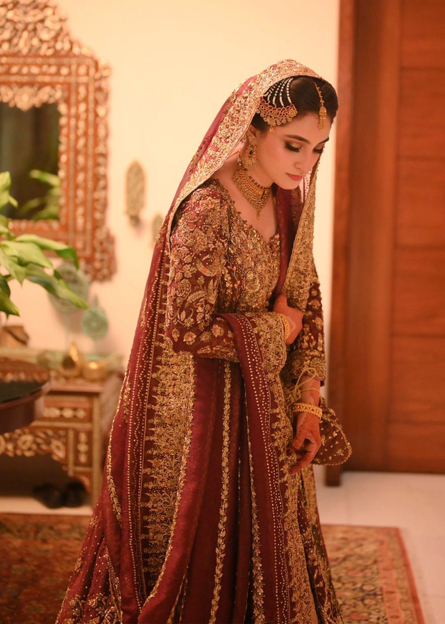 Pakistani Deep Maroon Gold Embroidered Velvet Bridal Lehenga (3-Piece) - Image 9