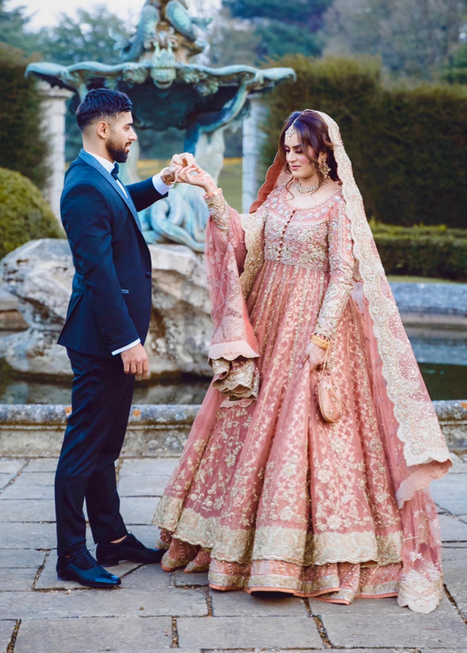 Blush Pink Embroidered Net Bridal Lehenga (3-Piece) - Image 1