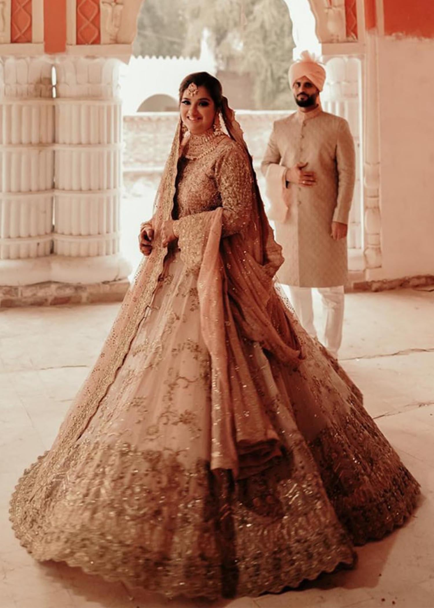 Pakistani Blush Gold Embellished Net Silk Bridal Lehenga (3-Piece) - Image 1