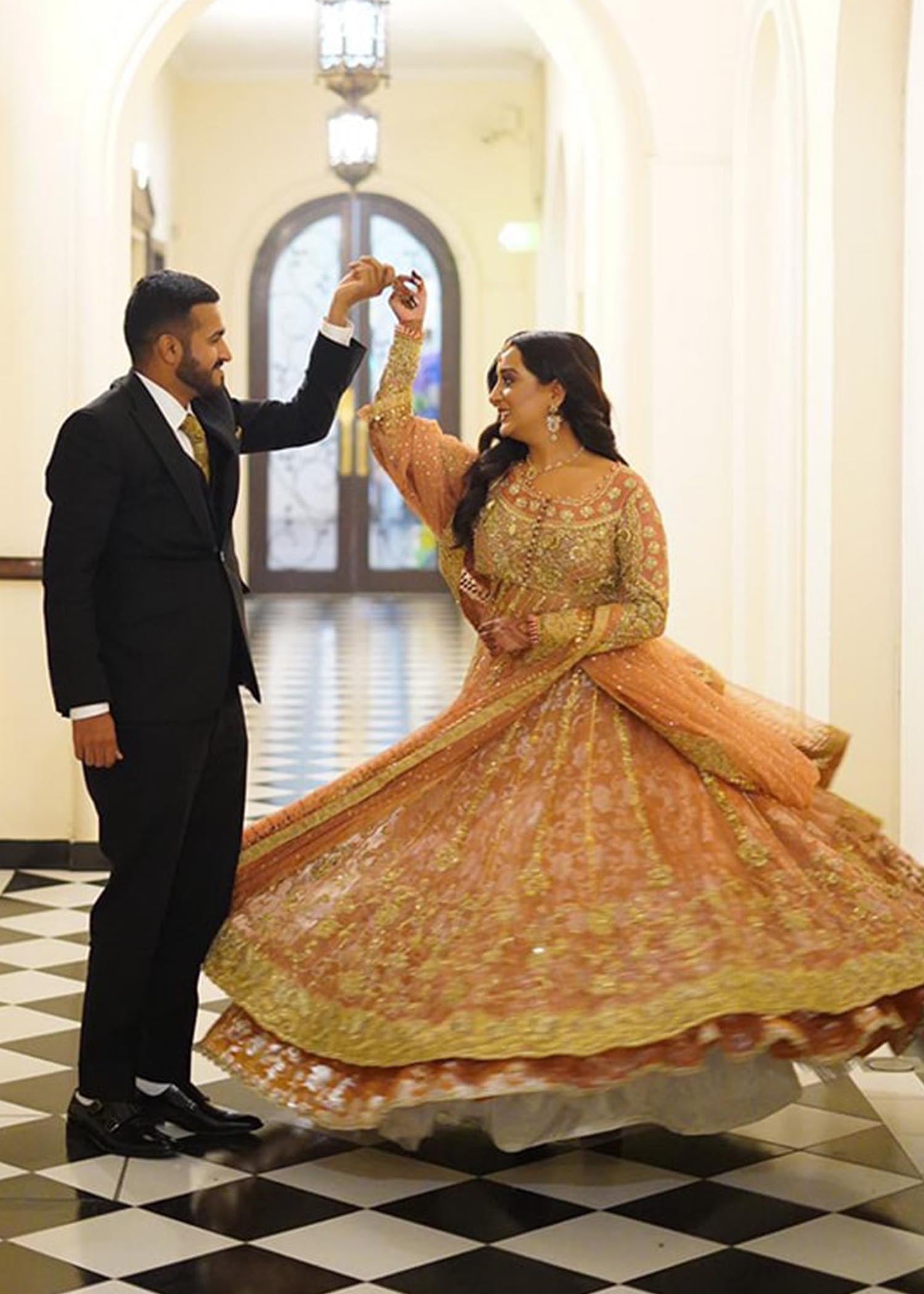 Pakistani Peach Gold Embroidered Net Bridal Lehenga (3-Piece) - Image 3