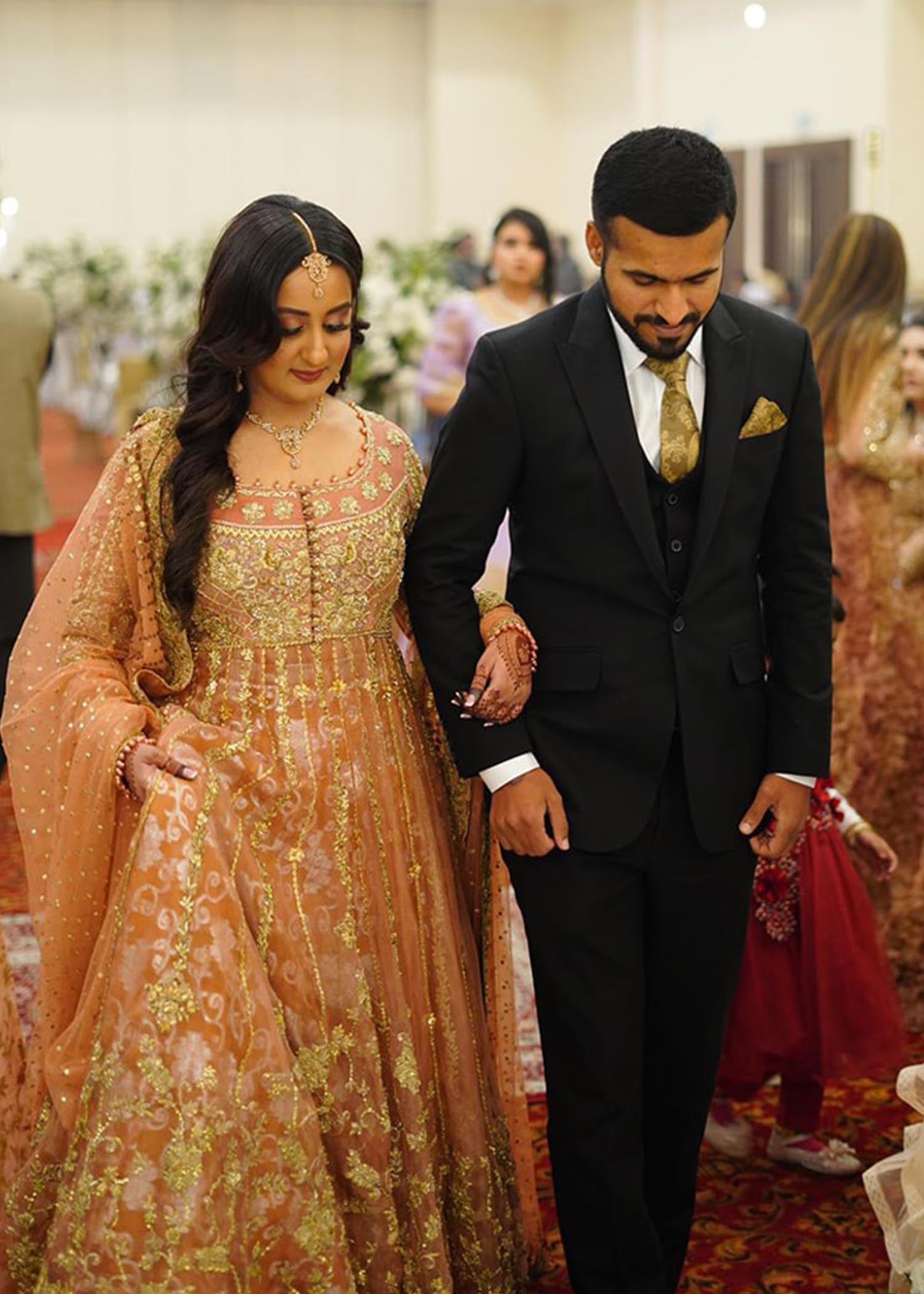 Pakistani Peach Gold Embroidered Net Bridal Lehenga (3-Piece) - Image 4