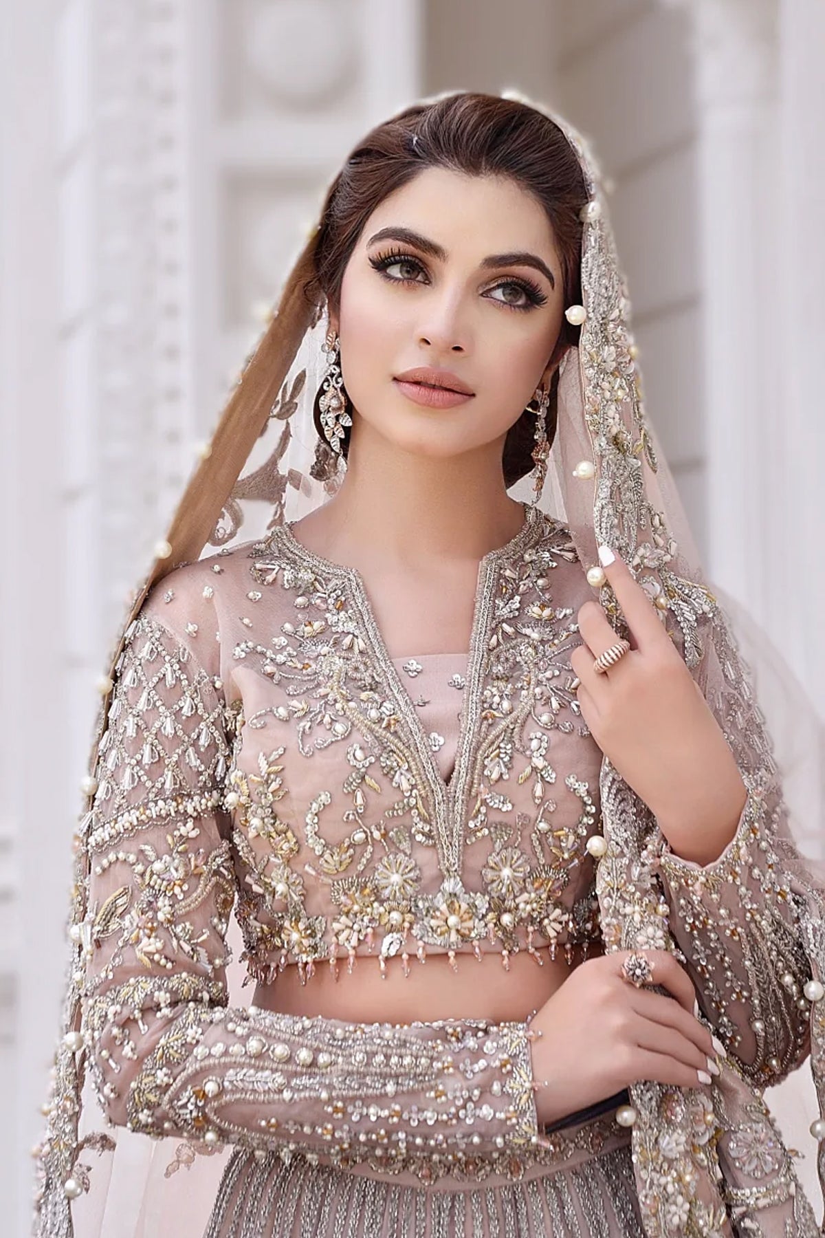 Pakistani Dusty Pink Embellished Net Lehenga Choli (3-Piece) - Image 1