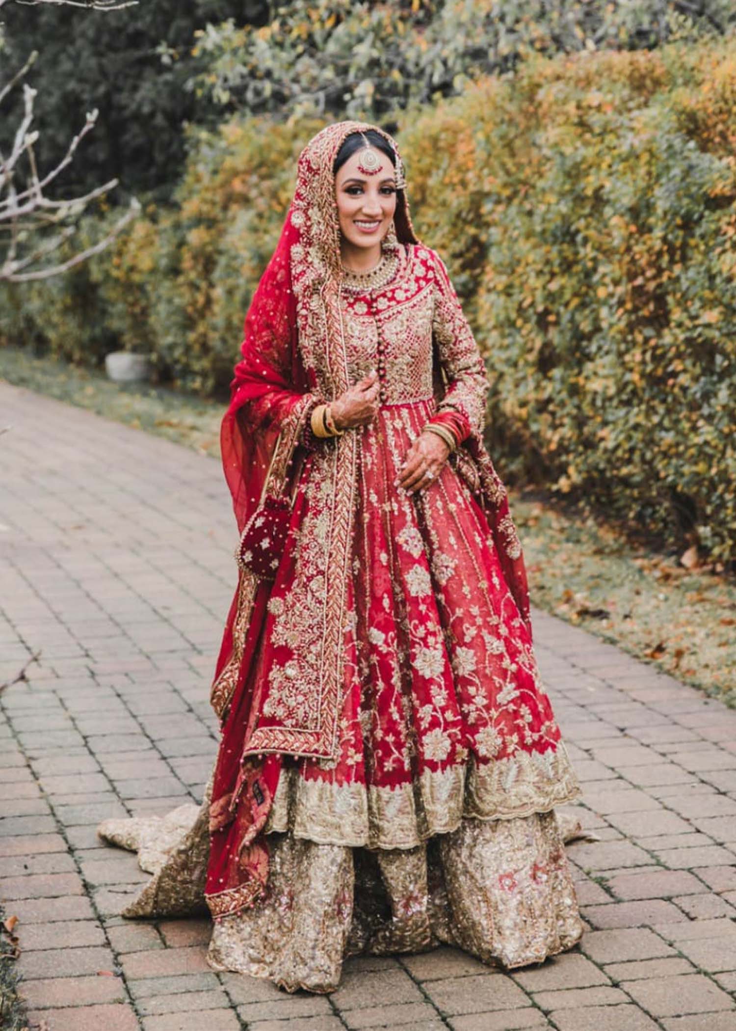 Pakistani Crimson Red Zardozi Net Bridal Lehenga (3-Piece) - Image 1