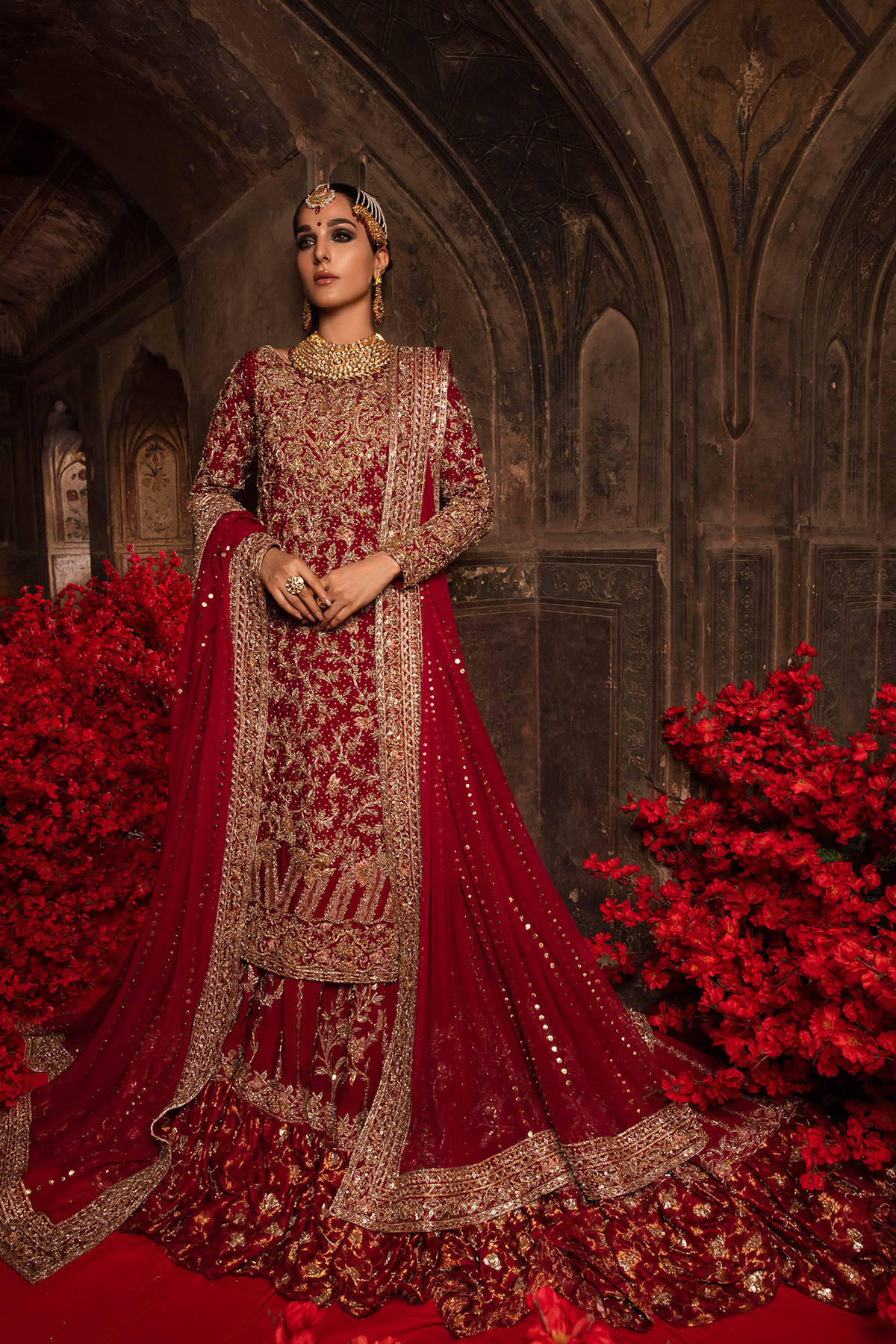 Pakistani Deep Red Embellished Khaddi Net Lehenga (3-Piece) - Image 1