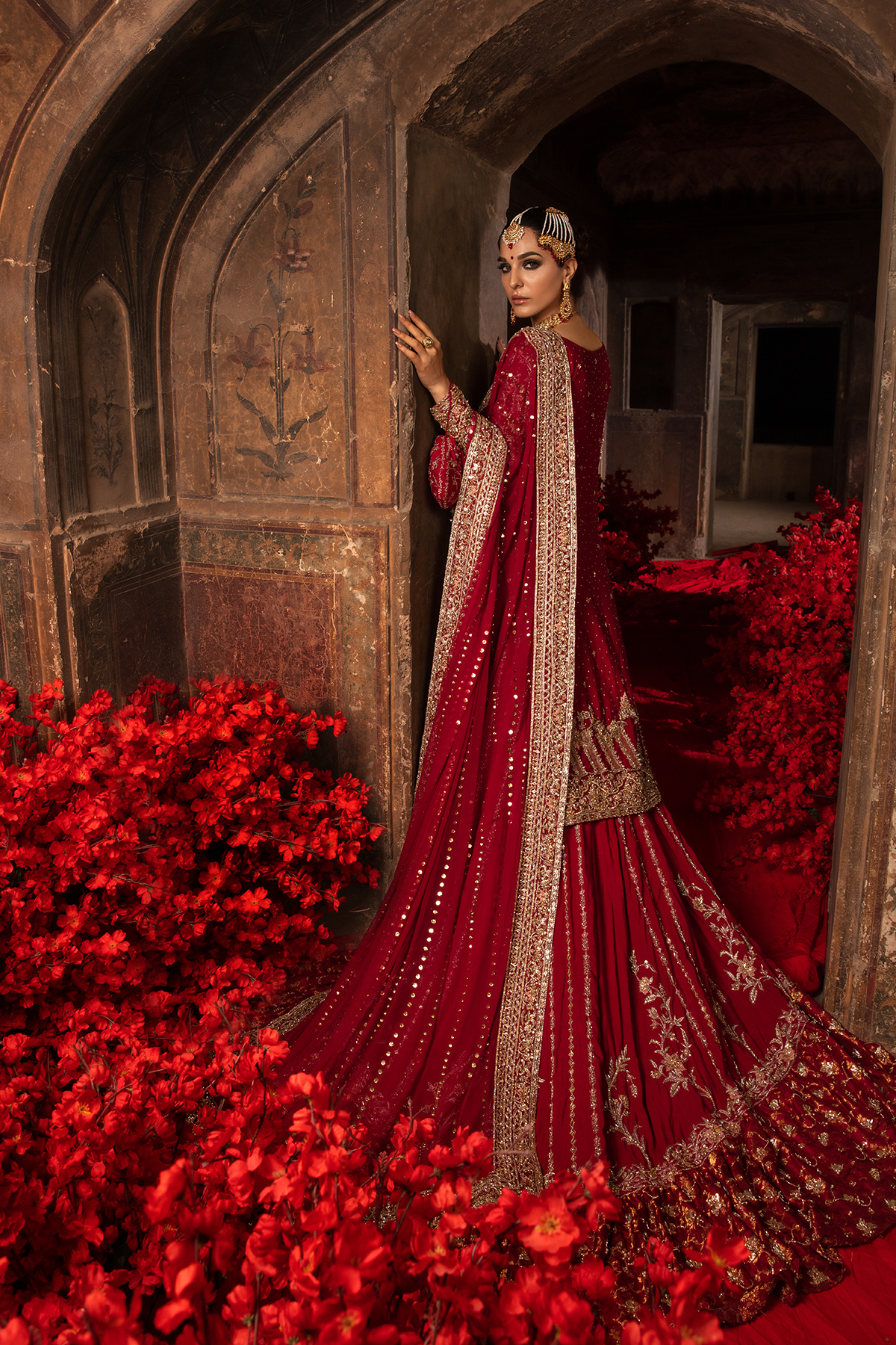 Pakistani Deep Red Embellished Khaddi Net Lehenga (3-Piece) - Image 2