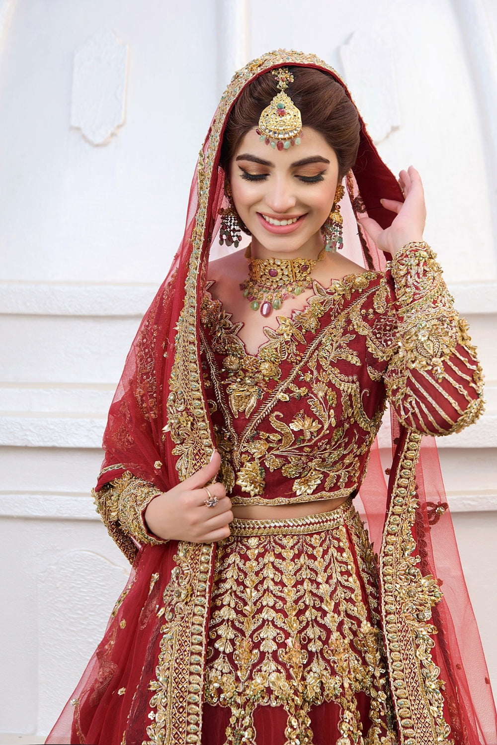 Pakistani Deep Red Embroidered Net Bridal Lehenga (3-Piece) - Image 2