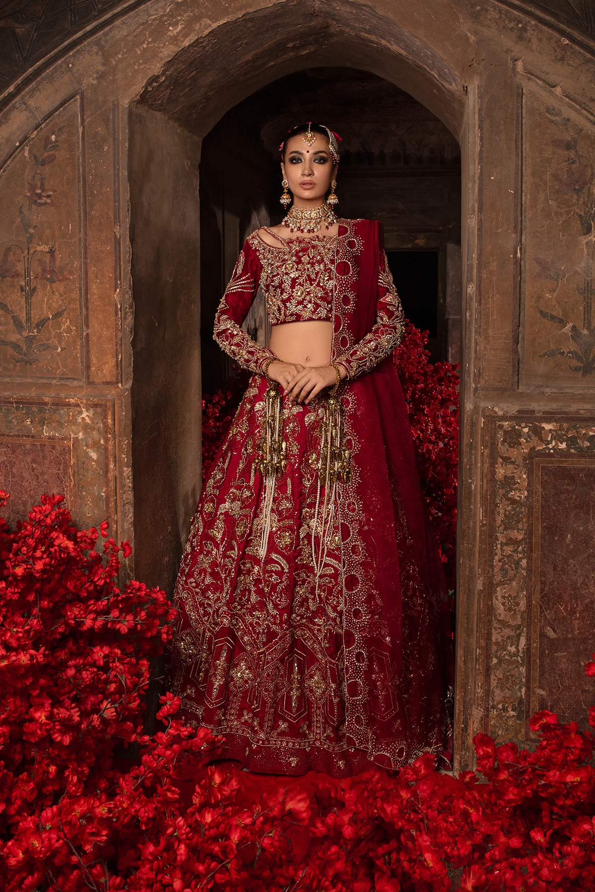 Pakistani Deep Red 3D Gold Embellished Raw Silk Lehnga Choli (3-Piece) - Image 1