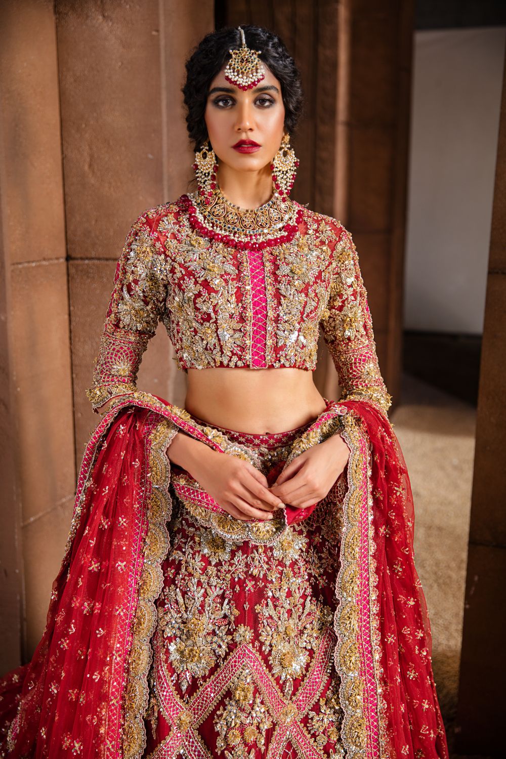Pakistani Red & Pink Embellished Net and Raw Silk Lehenga (3-Piece) - Image 1
