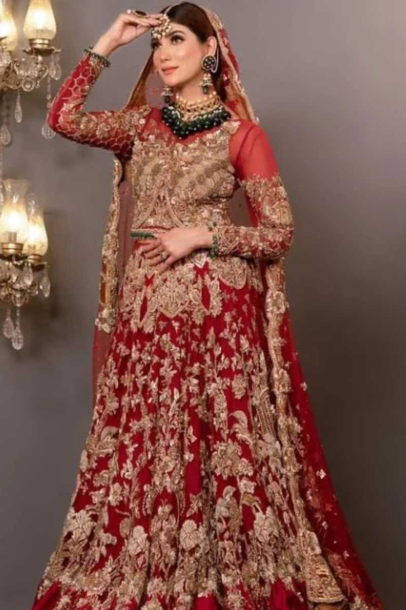 Pakistani Deep Red Embroidered Raw Silk Bridal Lehenga (3-Piece) - Image 1