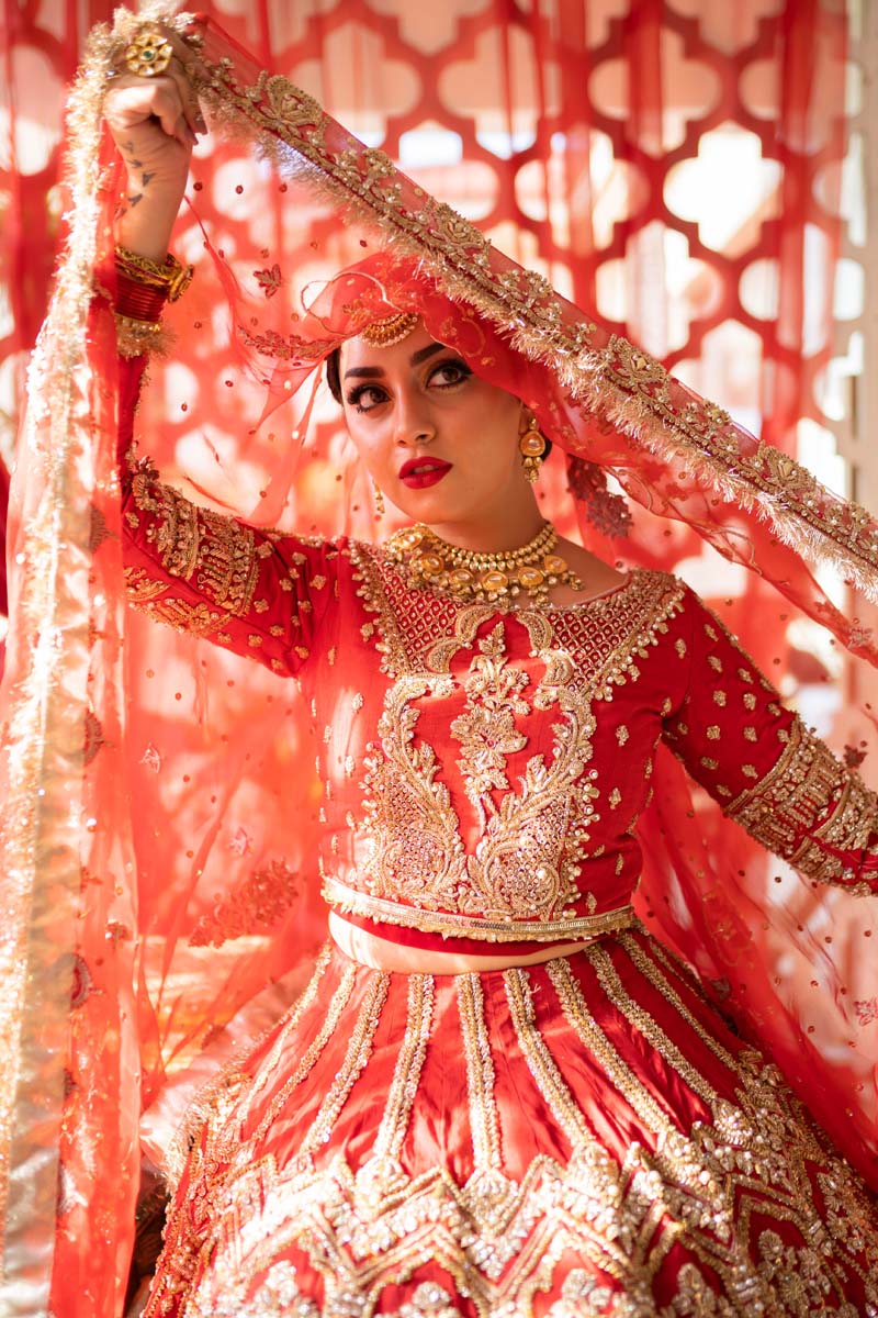 Pakistani Crimson Red Embroidered Raw Silk Bridal Lehenga (3-Piece) - Image 1