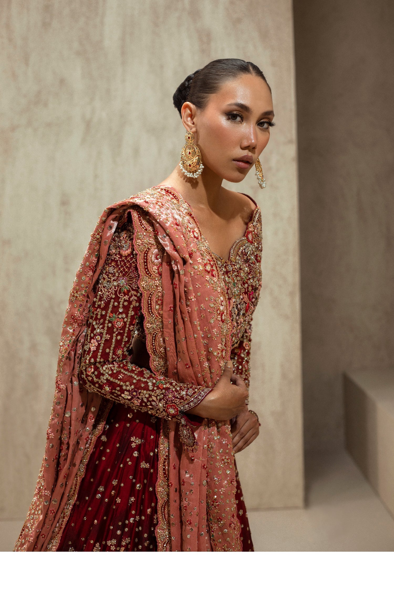 Pakistani Rouge Red Embellished Net Silk Lehenga (3-Piece) - Image 3