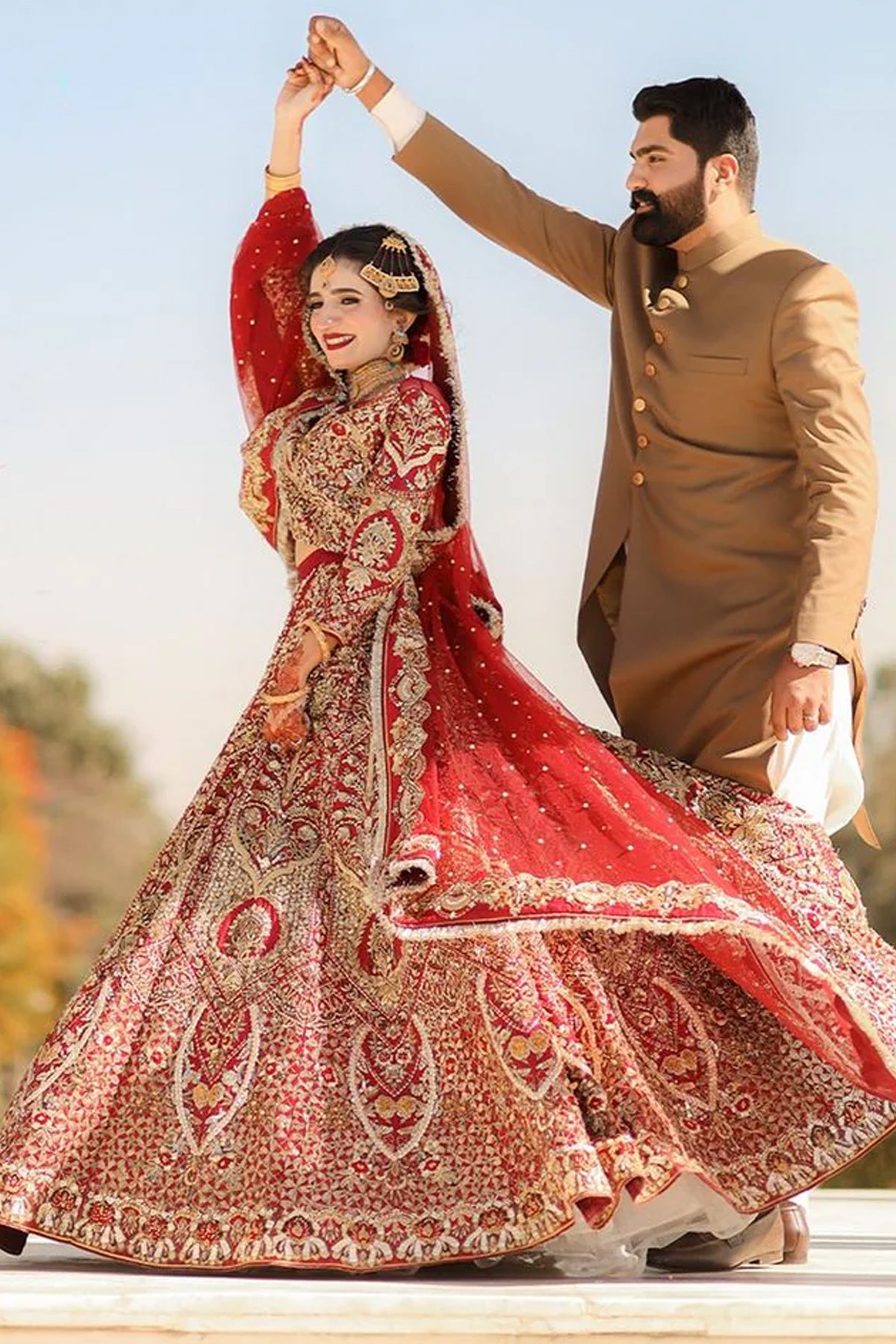 Pakistani Deep Red Embroidered Silk Bridal Lehenga (3-Piece) - Image 1