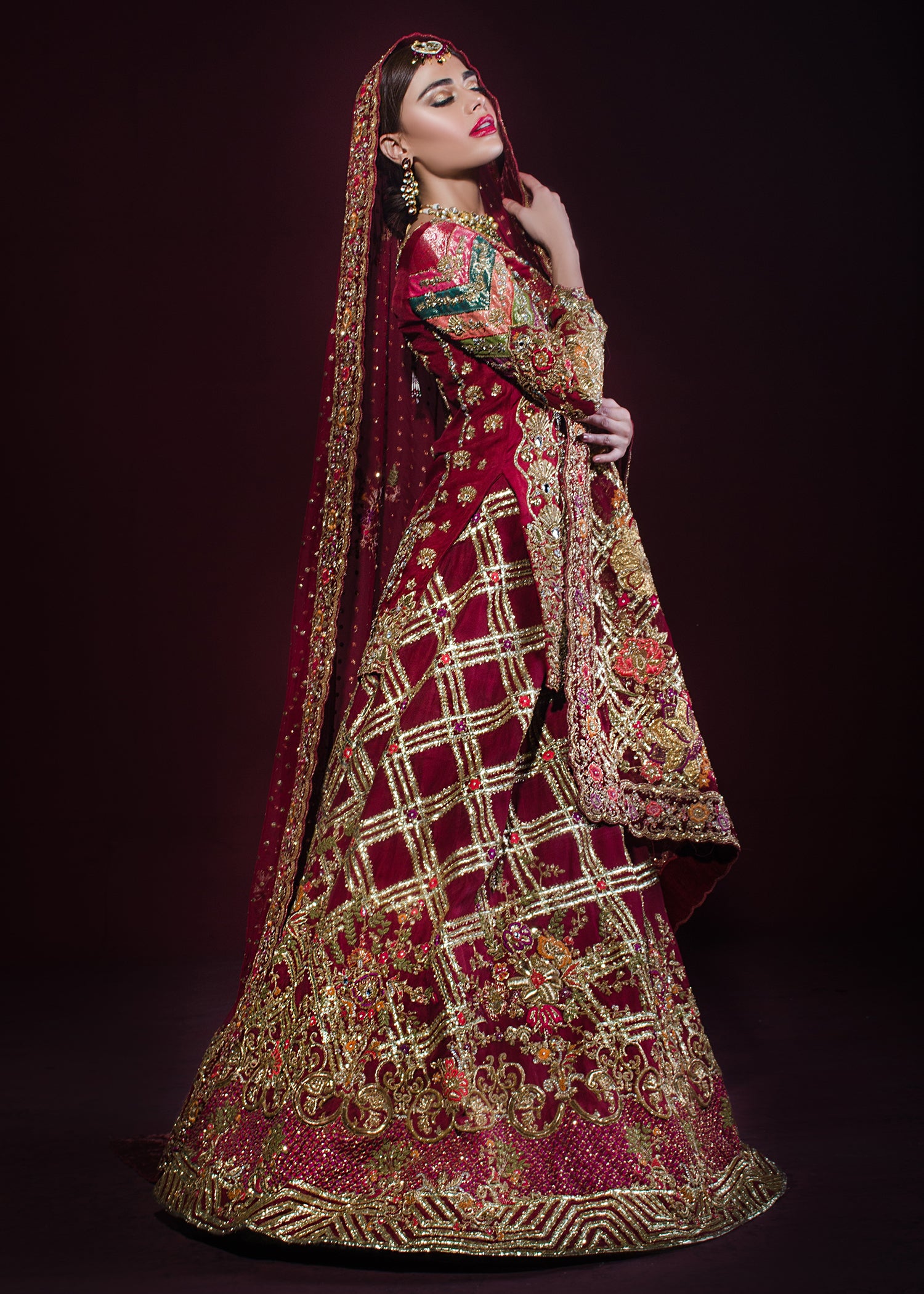Pakistani Deep Red Embroidered Velvet Bridal Lehenga (3-Piece) - Image 1