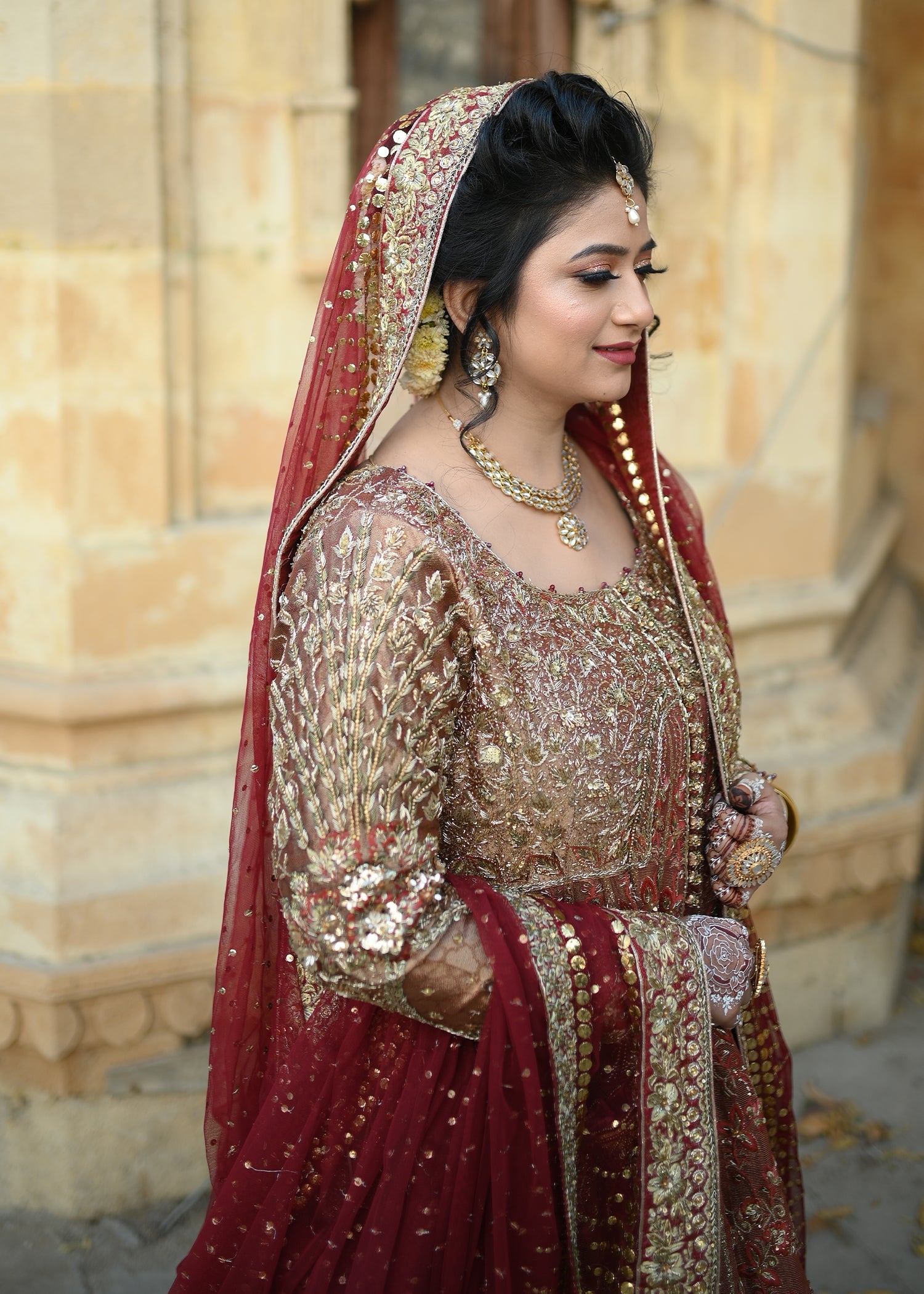 Pakistani Deep Red Gold Zardozi Velvet Bridal Lehenga (3-Piece) - Image 10