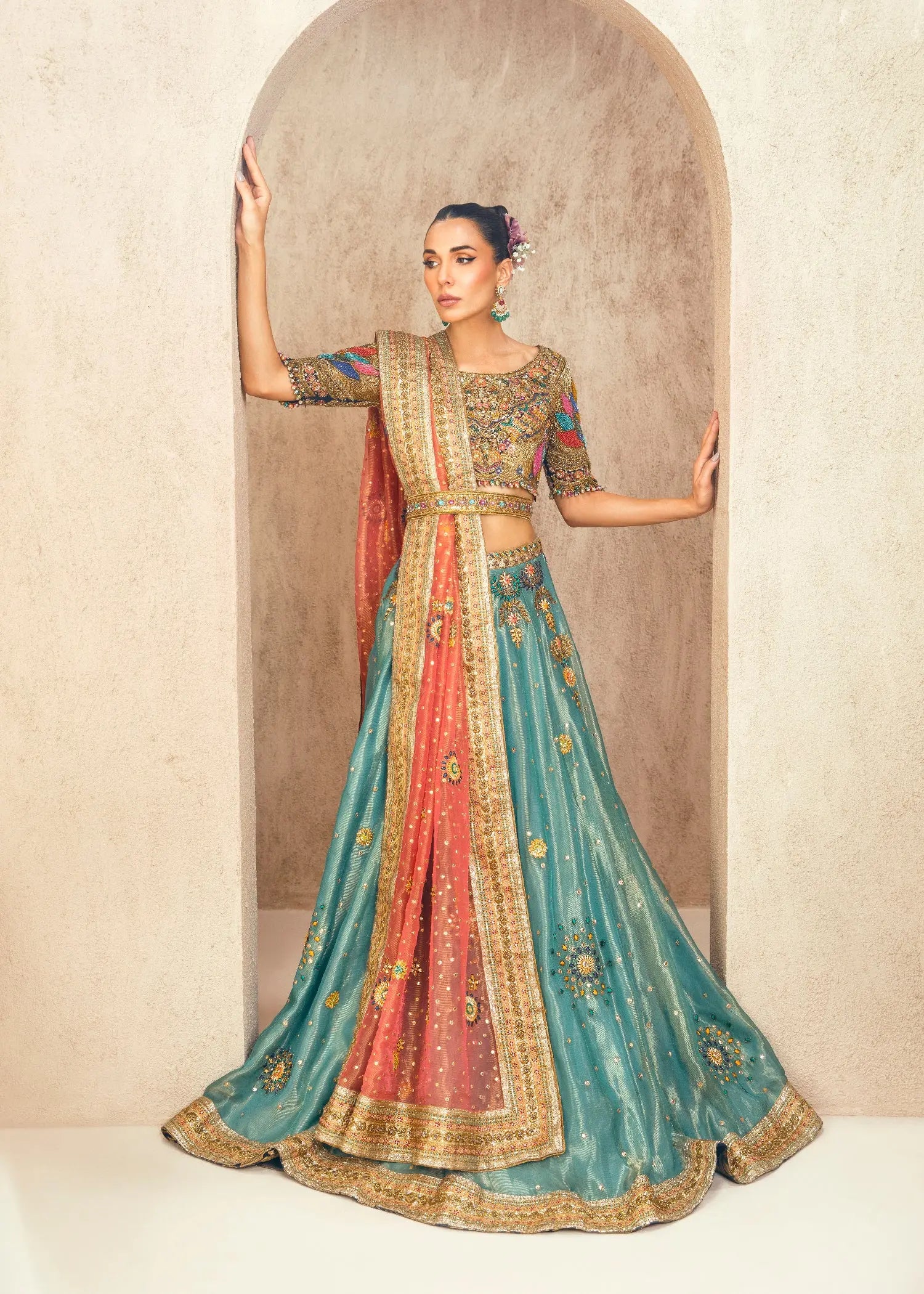 Pakistani Teal and Coral Hand-Embellished Net Lehenga Choli (3-Piece) - Image 1
