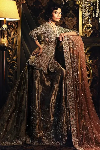 Pakistani Dull Gold & Peach Embellished Net Lehenga (3-Piece)