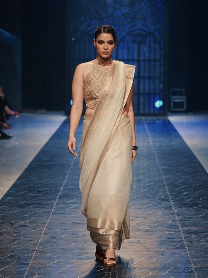 Pakistani White Net Sari with Gold Embroidered Halter Neck Blouse (2-Piece)